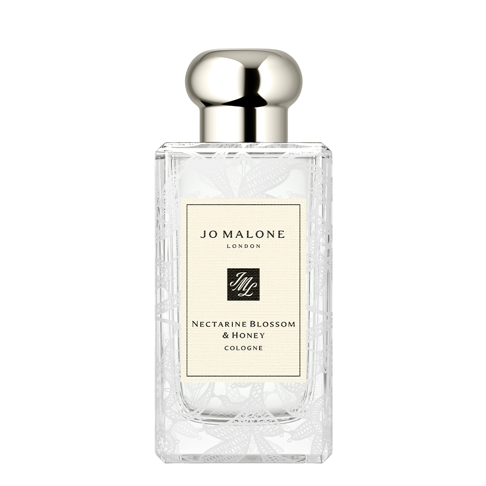 Cologne Nectarine Blossom & Honey motif dentelle Feuille de Marguerite